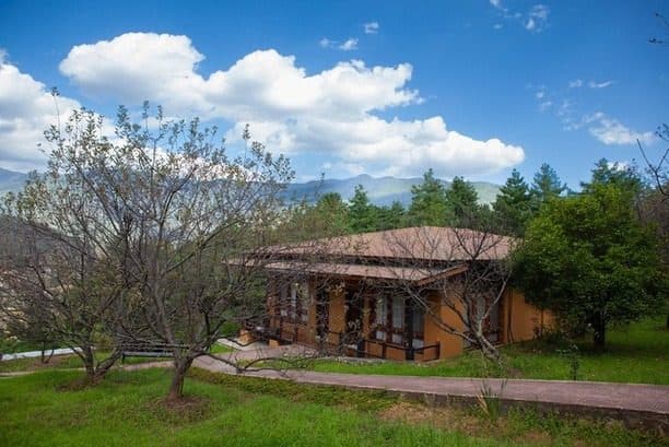 A cottage among apple trees